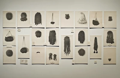Lorna Simpson, Wigs, 1994. Portfolio of waterless lithographs on felt, 72 x 162 ½ in. (overall). Edition AP 1/5 from an edition of 15. Toledo Museum of Art, Gift of Mrs. Webster Plass and of Miss Elsie C. Mershon in memory of Edward C. Mershon, by exchange, 2007.7A-MM